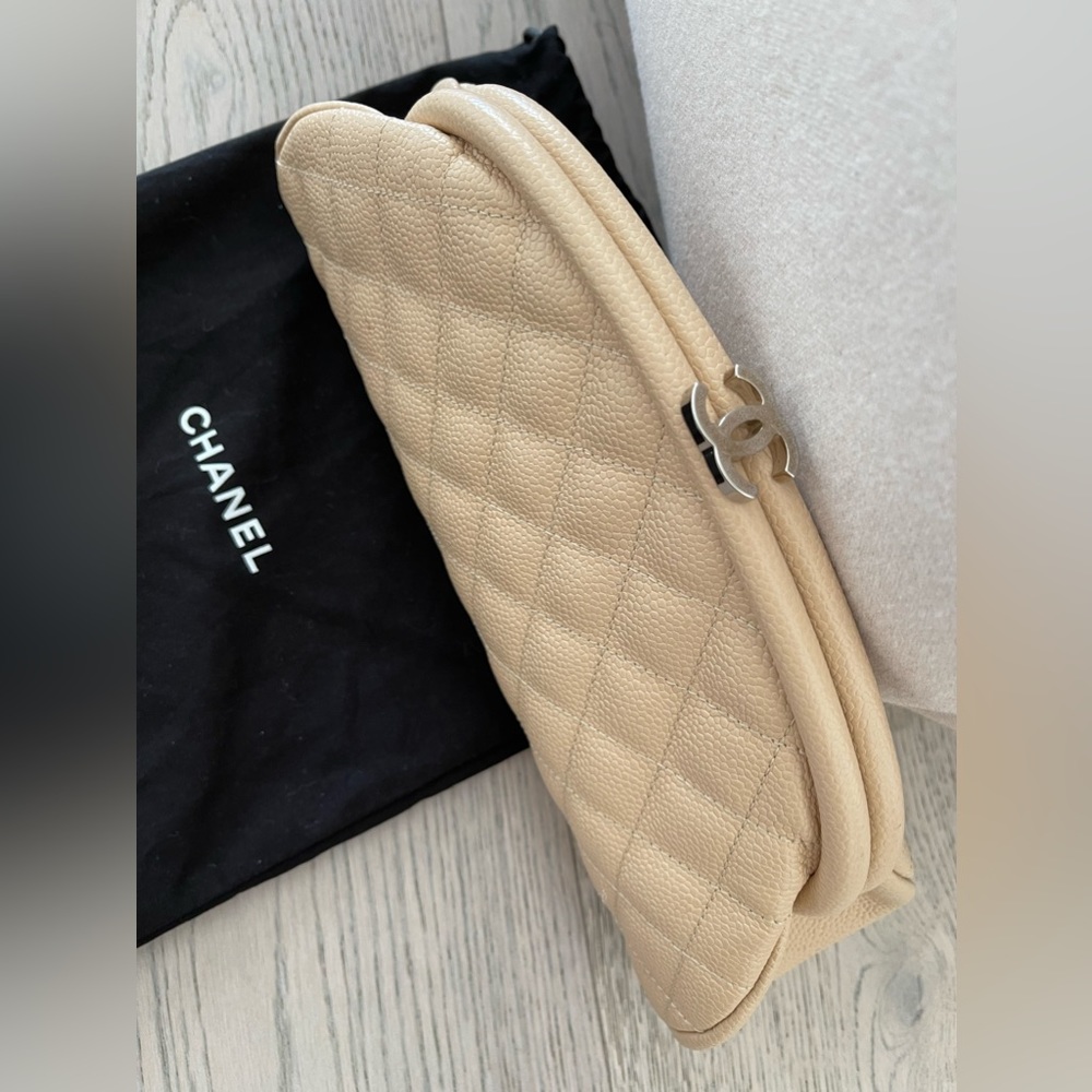 Beige Chanel half moon clutch